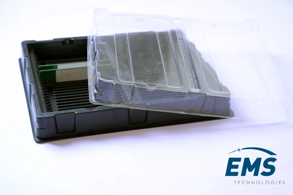 Black HIPS conductive thermoformed ESD tray with clear lid for secure component storage and transport, EMS Technologies