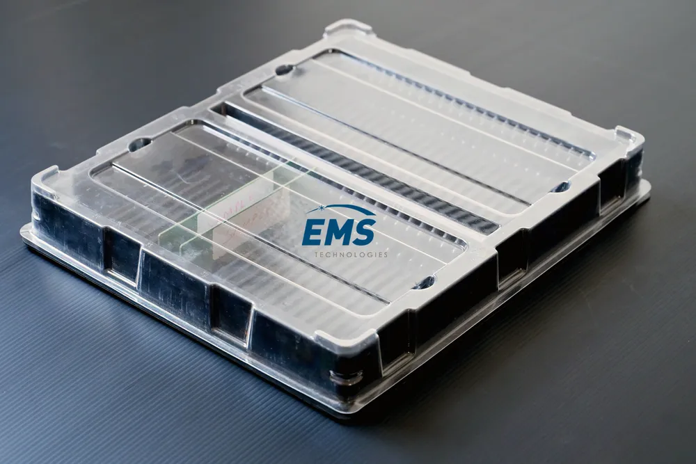 Clear PET thermoformed ESD tray for secure component storage and transport, EMS Technologies