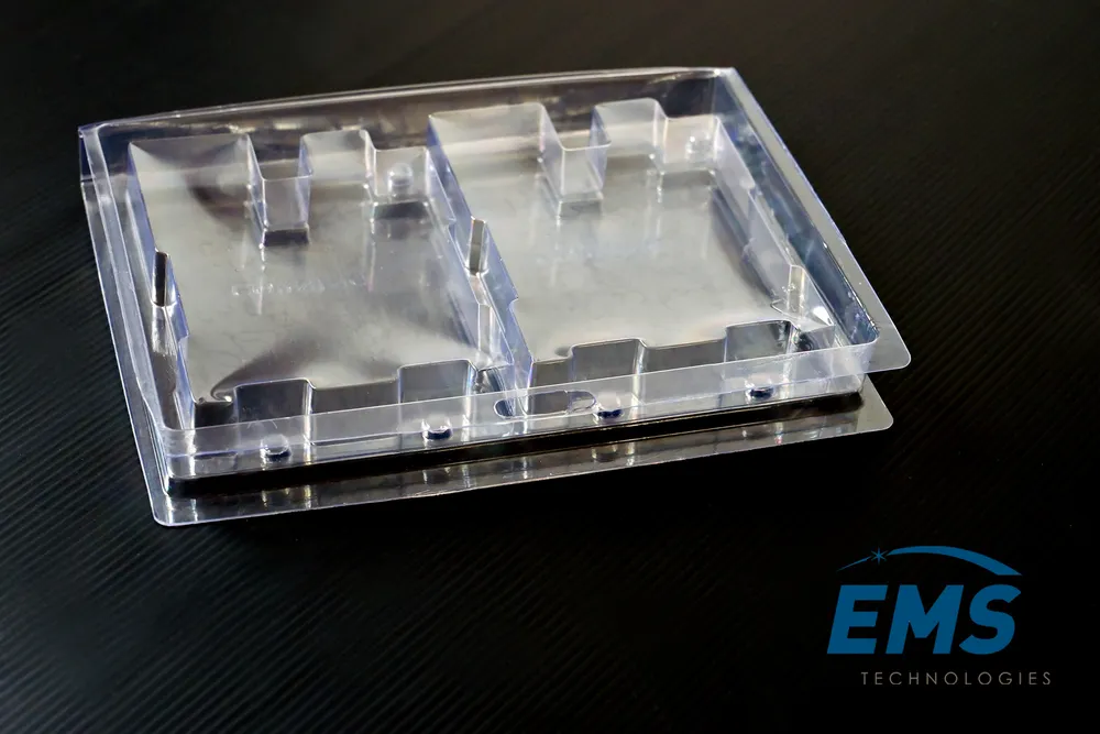 Clear PET thermoformed ESD tray for secure component storage and transport, EMS Technologies