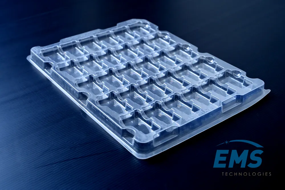 Clear PET thermoformed ESD tray for secure component storage and transport, EMS Technologies