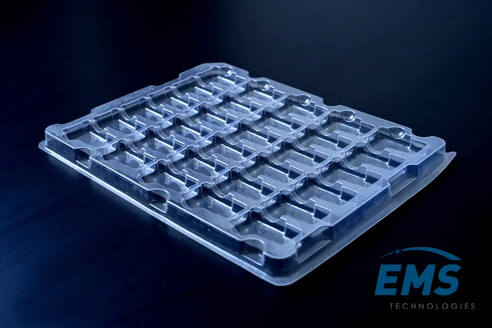 Clear PET thermoformed ESD tray for secure component storage and transport, EMS Technologies