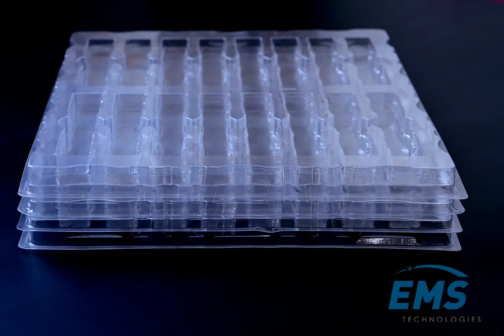 Clear PET thermoformed ESD tray for secure component storage and transport, EMS Technologies
