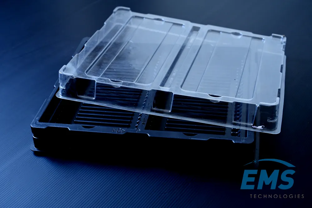 Clear PET thermoformed ESD tray for secure component storage and transport, EMS Technologies