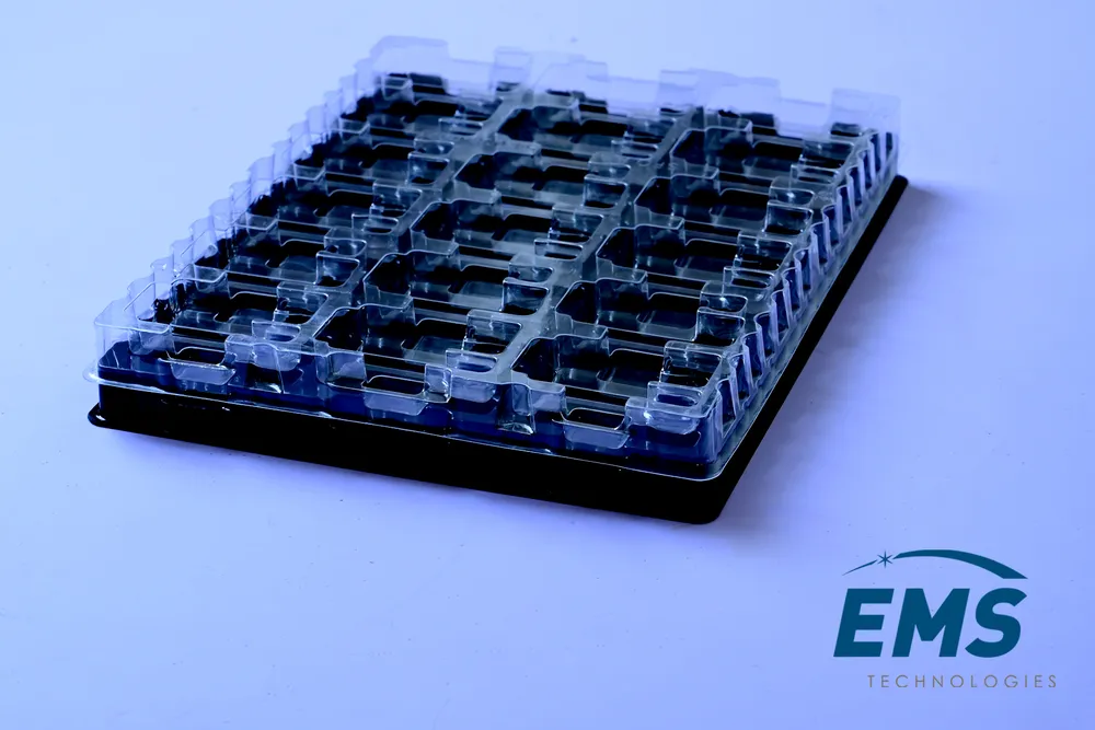 Clear PET thermoformed ESD tray for secure component storage and transport, EMS Technologies