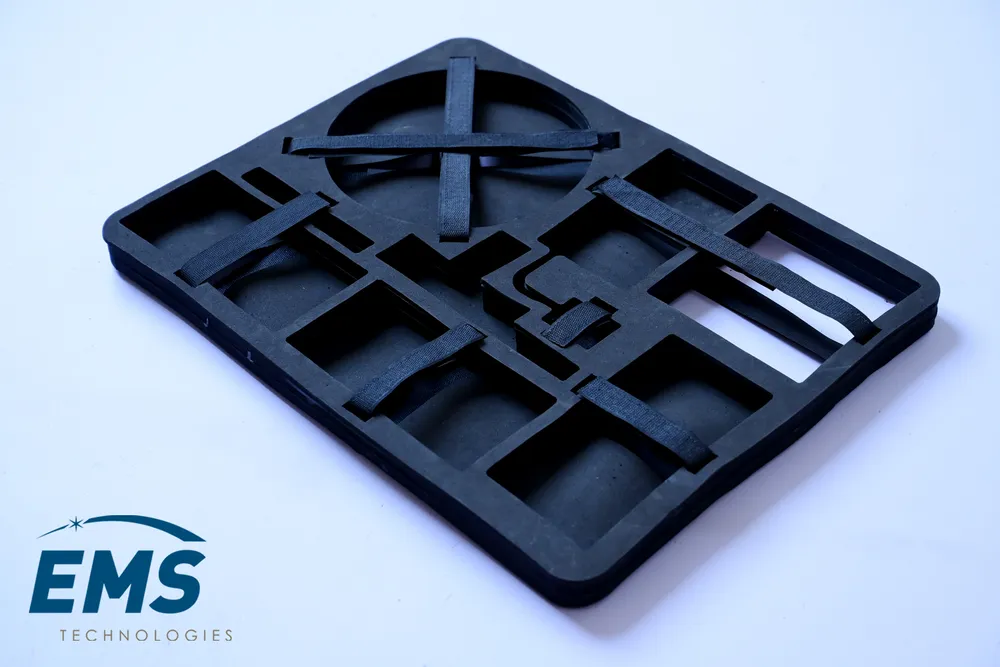 Black HIPS conductive thermoformed ESD tray for secure component storage and transport, EMS Technologies