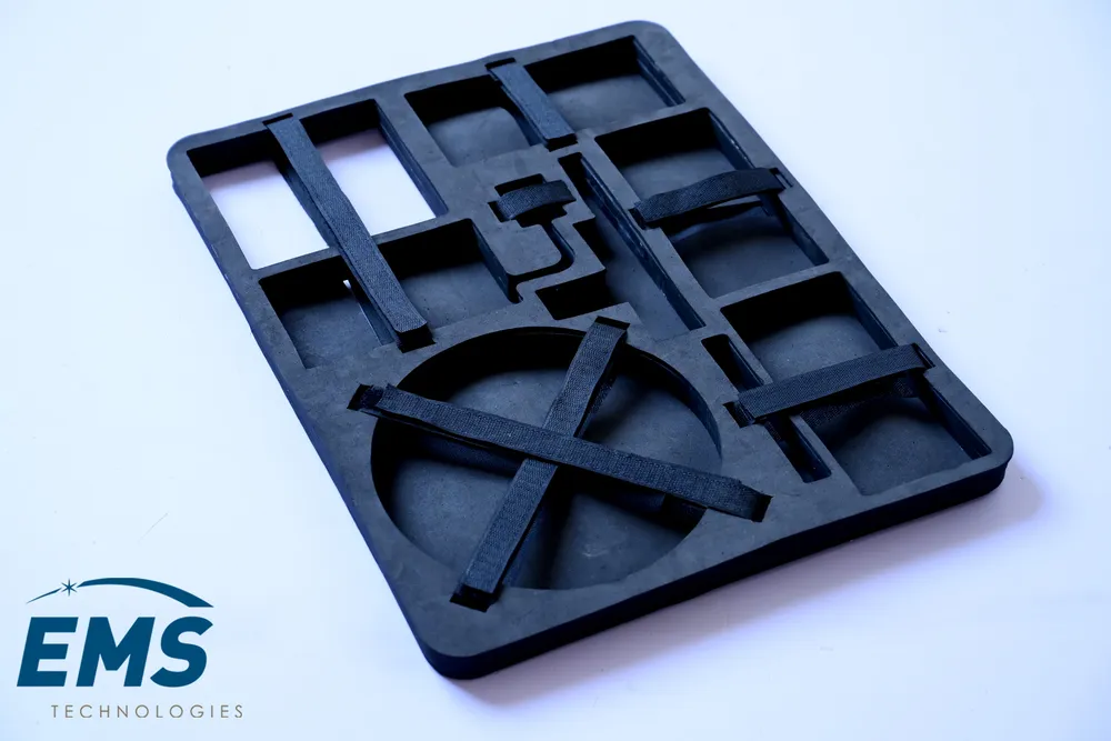 Black HIPS conductive thermoformed ESD tray for secure component storage and transport, EMS Technologies