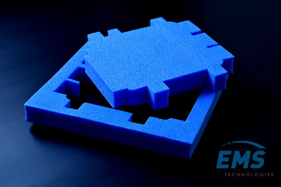 Blue foam insert cut to component geometry, EMS Technologies